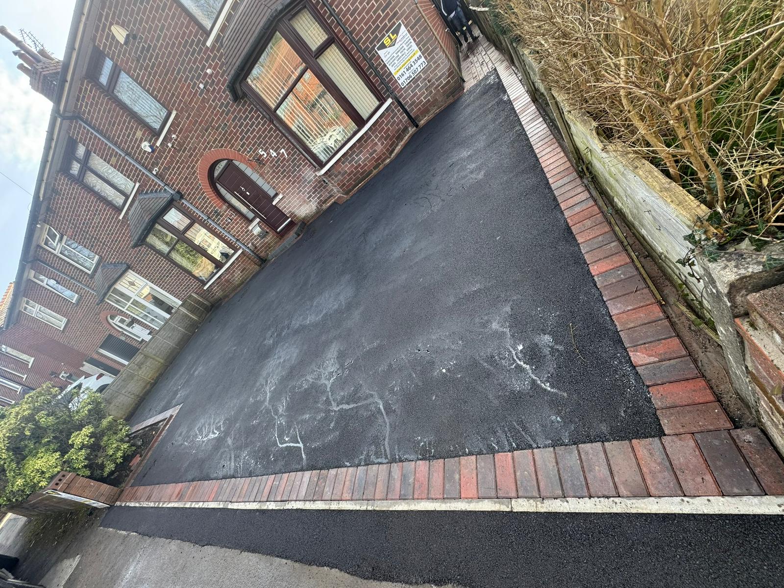 tarmac with block paving border