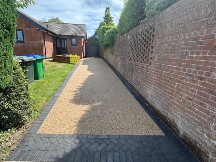 large resin driveway in golden quartz in Norden Rochdale