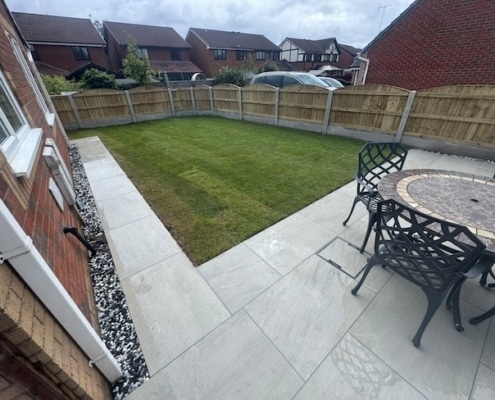 full turfing with porcelain patio completed in Royton Oldham by SL Paving & Landscapes